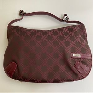 TUMI Burgundy Handbag with zippered compartment & cosmetics bag included